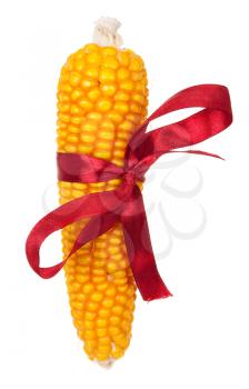 Ear of corn with red ribbon