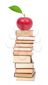 Stack of books and red apple 