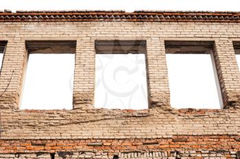 Empty window openings in the brick wall