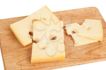 Cheese on kitchen plank