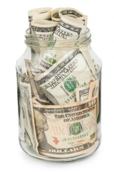 Many dollars in a glass jar