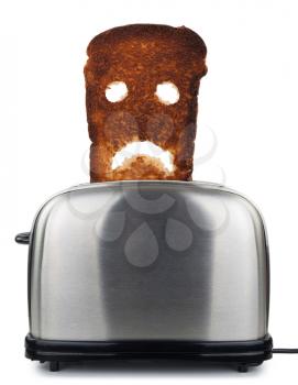 Burnt toast bread  in a toaster