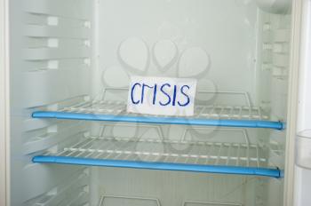 Label  the crisis in an empty refrigerator