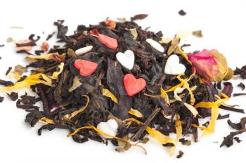 Black dry tea with fruits and petals