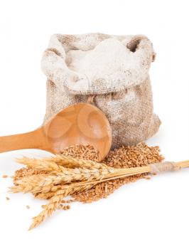 Flour in burlap bag with wheat ears