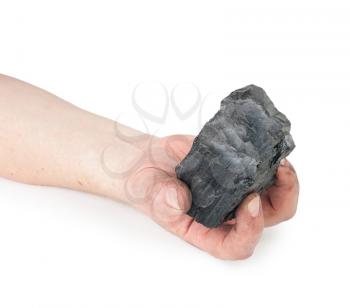 A piece of coal in hand