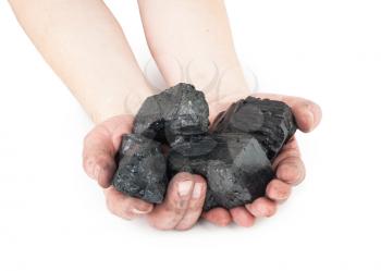 Pieces of coal in hands
