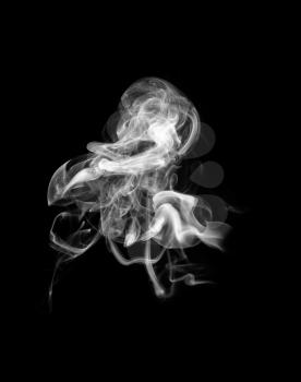 Abstract white smoke shape over black background
