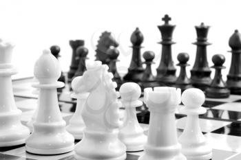 Black or white - chess on board over white