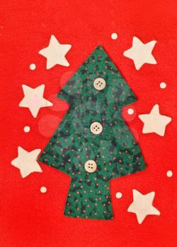 Christmas background - firtree, stars and snowflakes over red