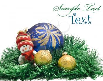 Christmas card - Plush toy with three colorful New Year decoration Balls in green tinsel over white