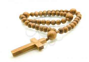 Close-up of Rosary beads isolated over white