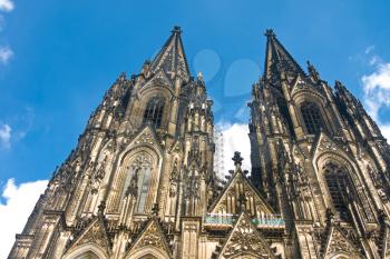 Koelner Dom of Saint Peter and Mary (Cologne Cathedral) over blue sky. UNESCO World Heritage Site.