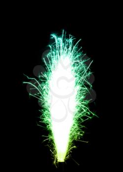 Colored (lettuce and turquoise) birthday fireworks candle over black