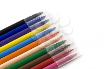 Colorful felt-tip markers or pens isolated over white background (Shallow DOF)