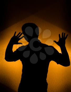 Disco party - back lit silhouette of dancing man
