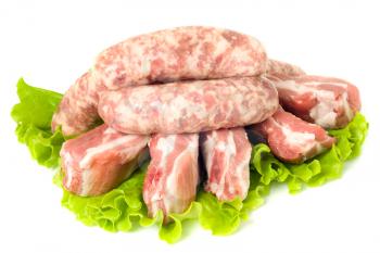 Five Pieces of Pork meat and Sausages. Isolated over white