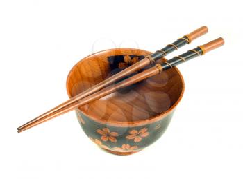 Japanese tableware. Chopsticks and a bowl isolated on white