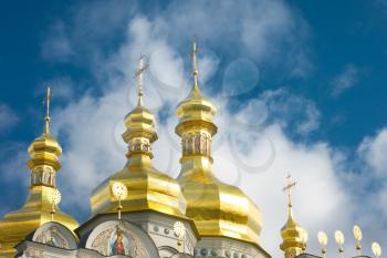 Kiev-Pecherskaya Laura. Cupola of Orthodox church and blue sky with clouds