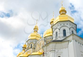 Kiev-Pecherskaya Laura. Golden domes and blue sky with clouds
