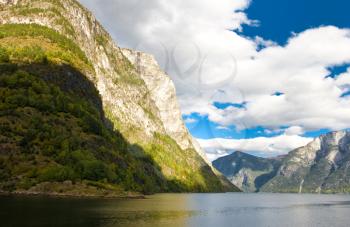 Mountains, norwegian fjords and blue sky