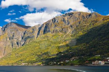 Norwegian fjords: Mountains, blue sky and trees