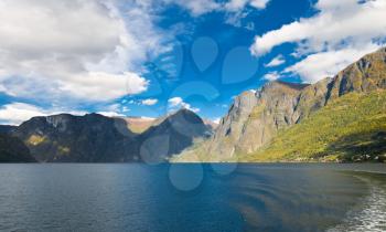 Norwegian nature. Fiords, mountains and blue sky