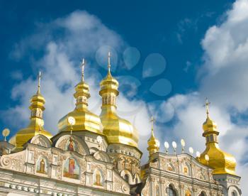 Ukraine, Kiev-Pecherskaya Laura. Cupola of Orthodox church and blue sky with clouds