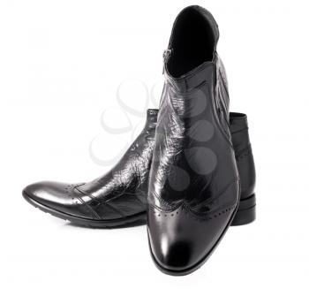 Pair of Black leather mens boots over white background. Side view