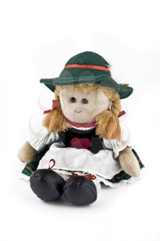 Rag doll in national (folk) Austrian costume isolated over white background