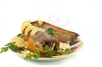 Shore dinner - bloated catfish (sheatfish) with lemon and parsley