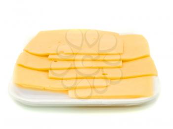 Sliced hard cheese over the white background