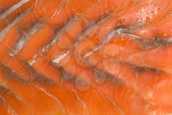 Tasty background. Sliced hunchback salmon