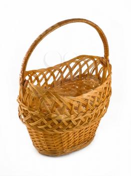 Wicker woven basket over white background