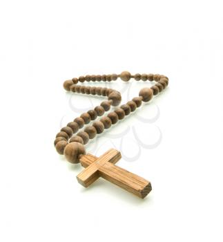 Wooden rosary beads isolated over white