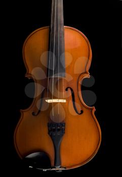 Beautiful antique violin over black background
