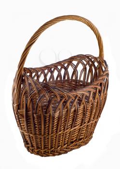 Brown Wicker woven basket over white background 
