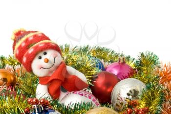 Christmas comes - Funny white snowman and decoration balls over white