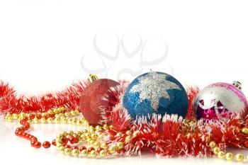 Christmas greeting card - red, blue and pink balls over white