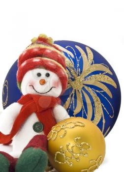 Cuddly Christmas decoration toy with colorful New Year Balls over white with focus on the back