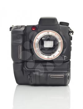 Front view of professional Dslr camera body with vertical grip and its mirror over white background