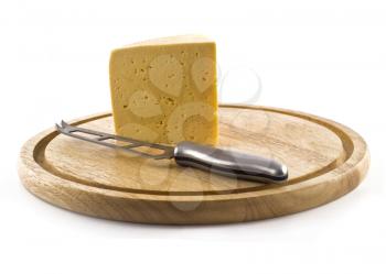 Knife and cheese on the board isolated over white