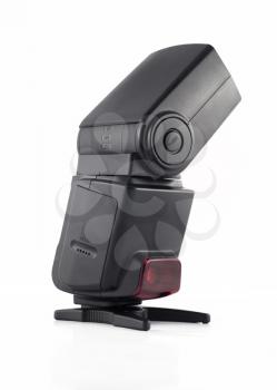 Professional flash unit for digital camera isolated over white