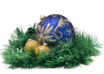 Three Beautiful Christmas or New Year balls in green tinsel over white