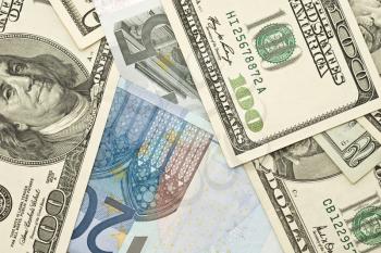 Wealth and success - US dollar and Euro banknotes