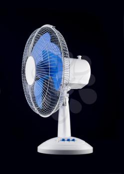 White cooling fan over black background