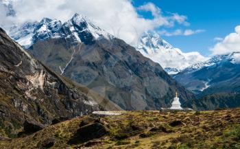 Buddhist stupe or chorten and Lhotse peaks in Himalayas. Religion in Nepal