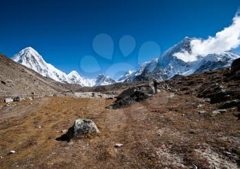 Hiking in Himalayas: Pumori summit and mountains. At height 5000m