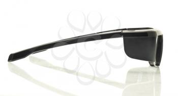 Stereo 3D TV: side view active shutter glasses over white background