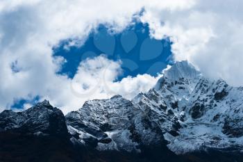 Thamserku Mountain summit in Himalayas. Pictured in Nepal